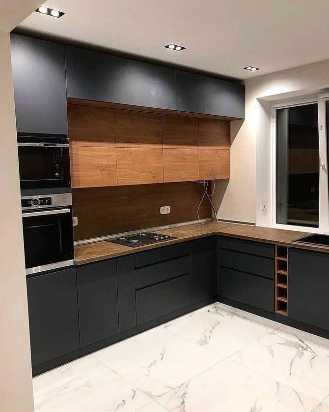 Угловая кухня чёрного цвета в стиле Лофт