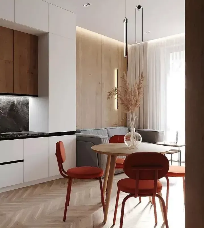 Дизайн кухни-гостиной с диваном в современном стиле