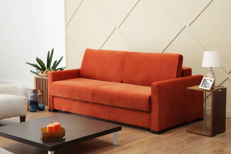 Оранжевый диван в интерьер