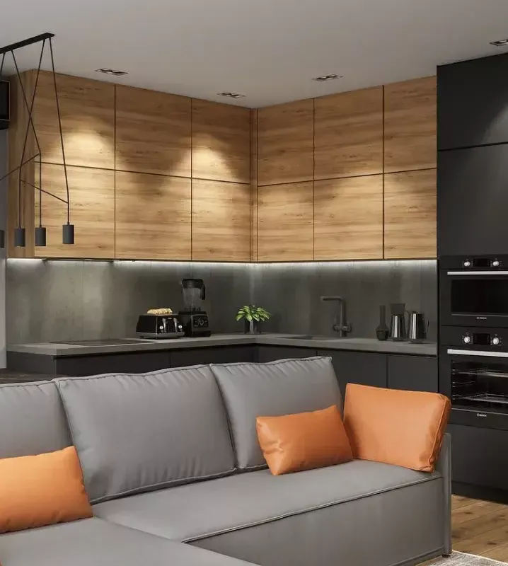 Серый диван в интерьере кухни-гостиной