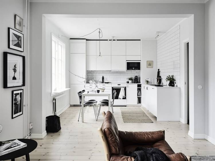 Белая кухня гостиная в скандинавском стиле