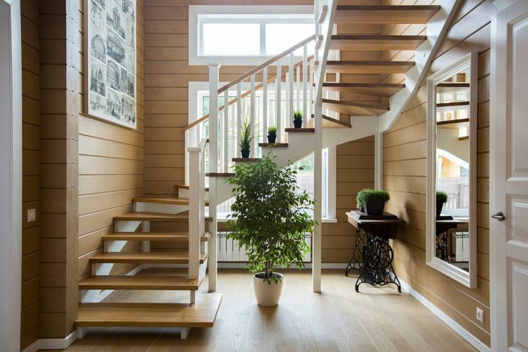 Как оформить пространство под лестницей