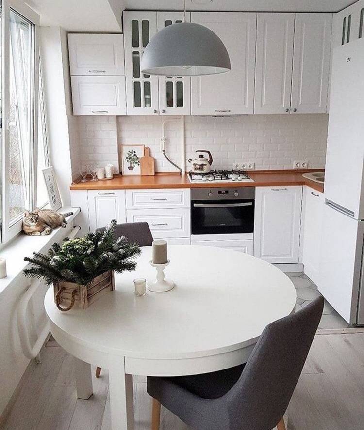 Белый круглый стол для кухни